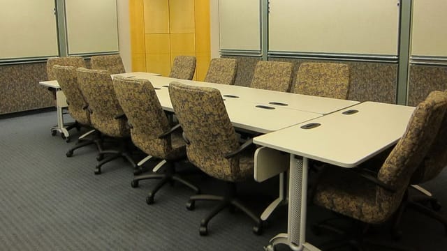 "AMA Conference Center meeting room with ergonomic chairs for corporate workshops"