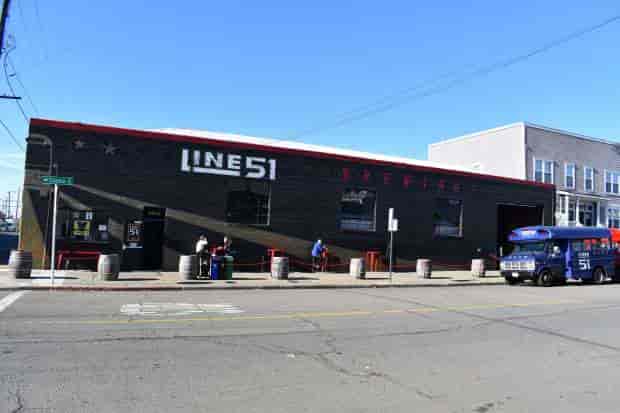 Draft List at Line 51 Brewing Company, featuring industrial decor for casual events.