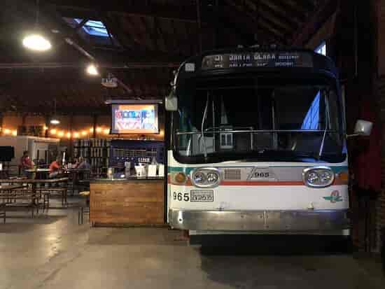 Vintage bus bar in industrial event space at Line 51 Brewing Company. Perfect for gatherings.