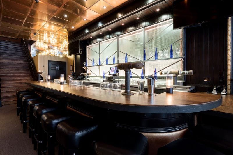 Sleek modern bar at Toy Soldier, perfect for cocktail receptions and networking events.
