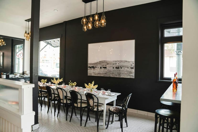 Elegant communal table setup for intimate gatherings and corporate events in Marlowe.