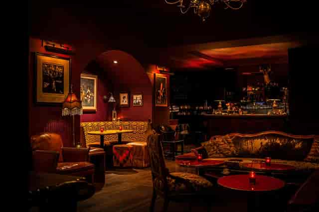 Stylish speakeasy venue with warm lighting for upscale events and private gatherings.