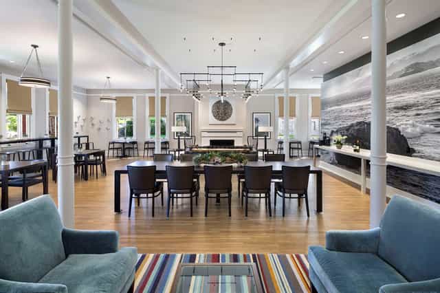 Elegant meeting room with natural light, perfect for corporate events and workshops.