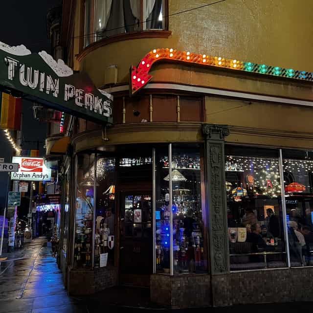 Upstairs Mezzanine at The Royale: vibrant venue with neon signs for lively events and parties.
