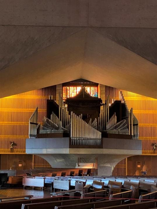 Pope St. John Paul II Room organ in Cathedral, ideal for concerts and events.