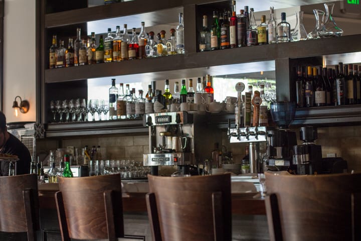 Well-stocked bar at Marzano Restaurant, perfect for networking events and cocktail receptions.