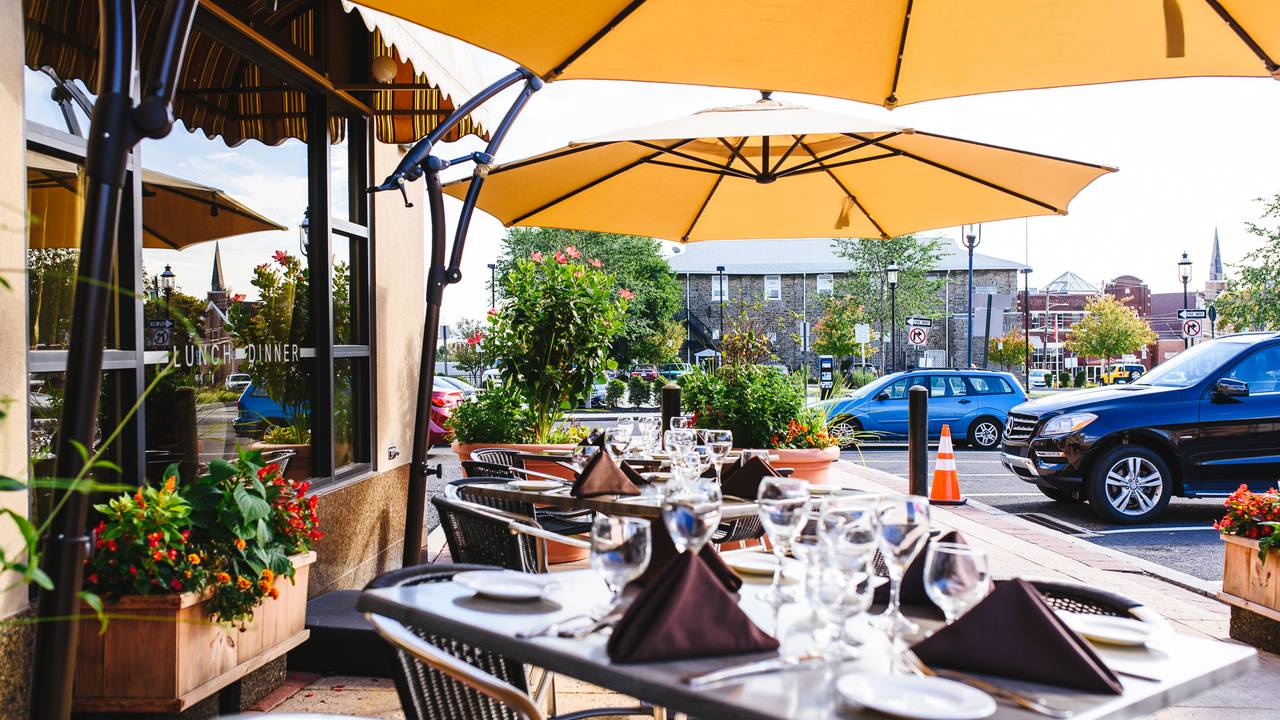 Outdoor dining setup at Marzano Restaurant, perfect for receptions and networking events.