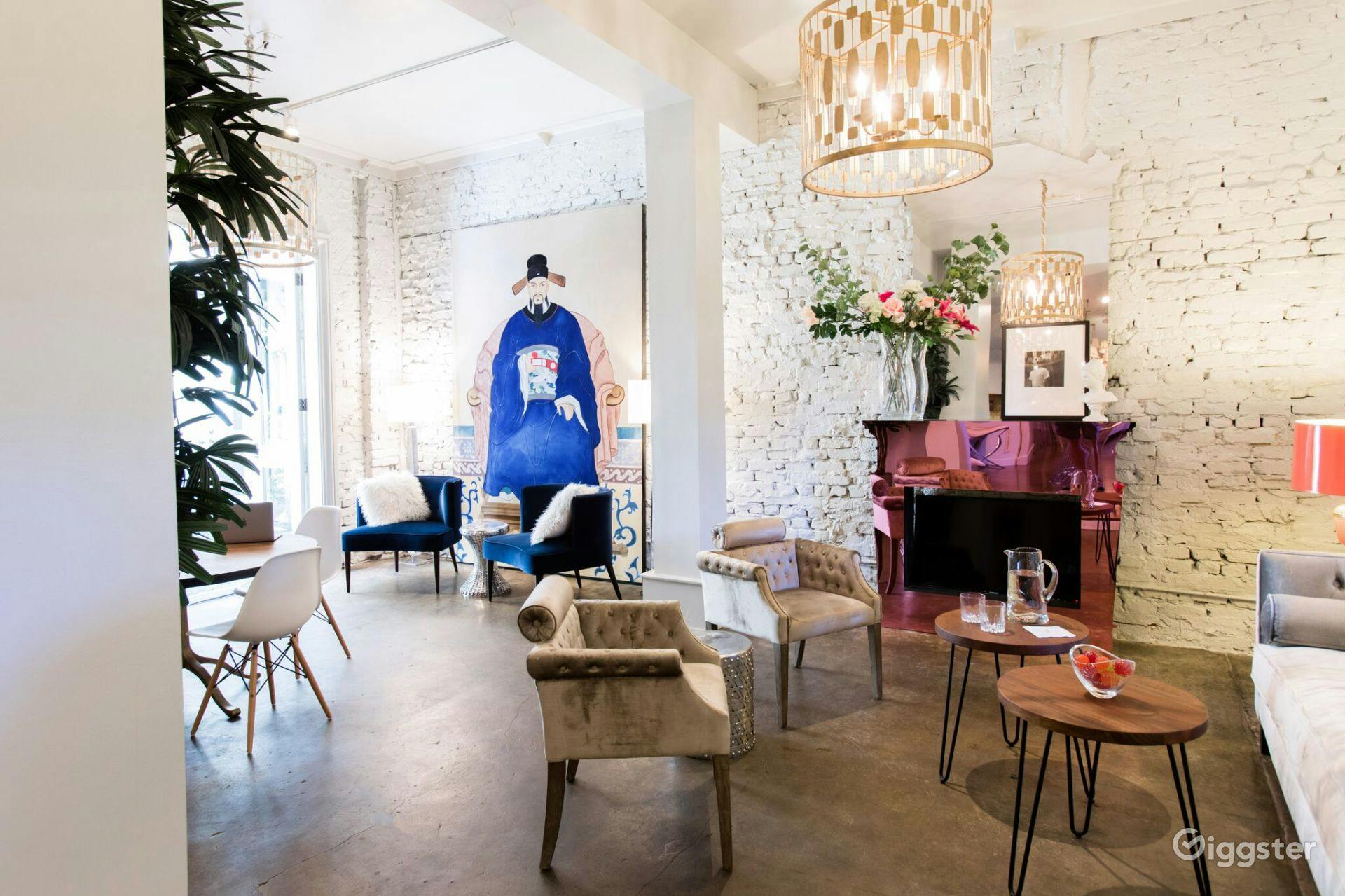 Stylish Villa Fontaine event space with exposed brick, ideal for networking and gatherings.