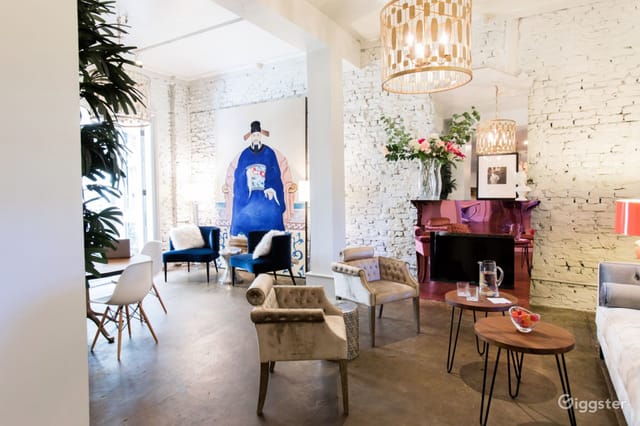 Stylish Villa Fontaine event space with exposed brick, ideal for networking and gatherings.