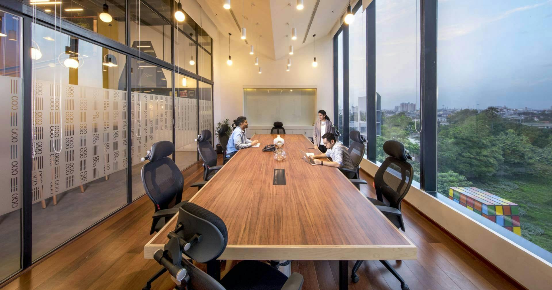 Modern conference room with large windows in Anchor Coworking for productive meetings.