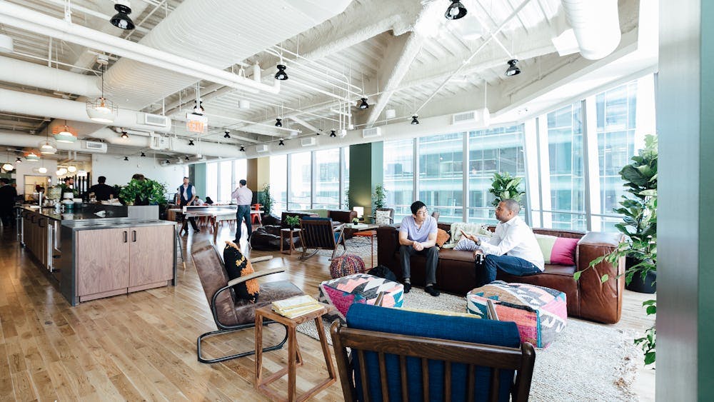 Modern private office space with natural light for networking and collaboration events.