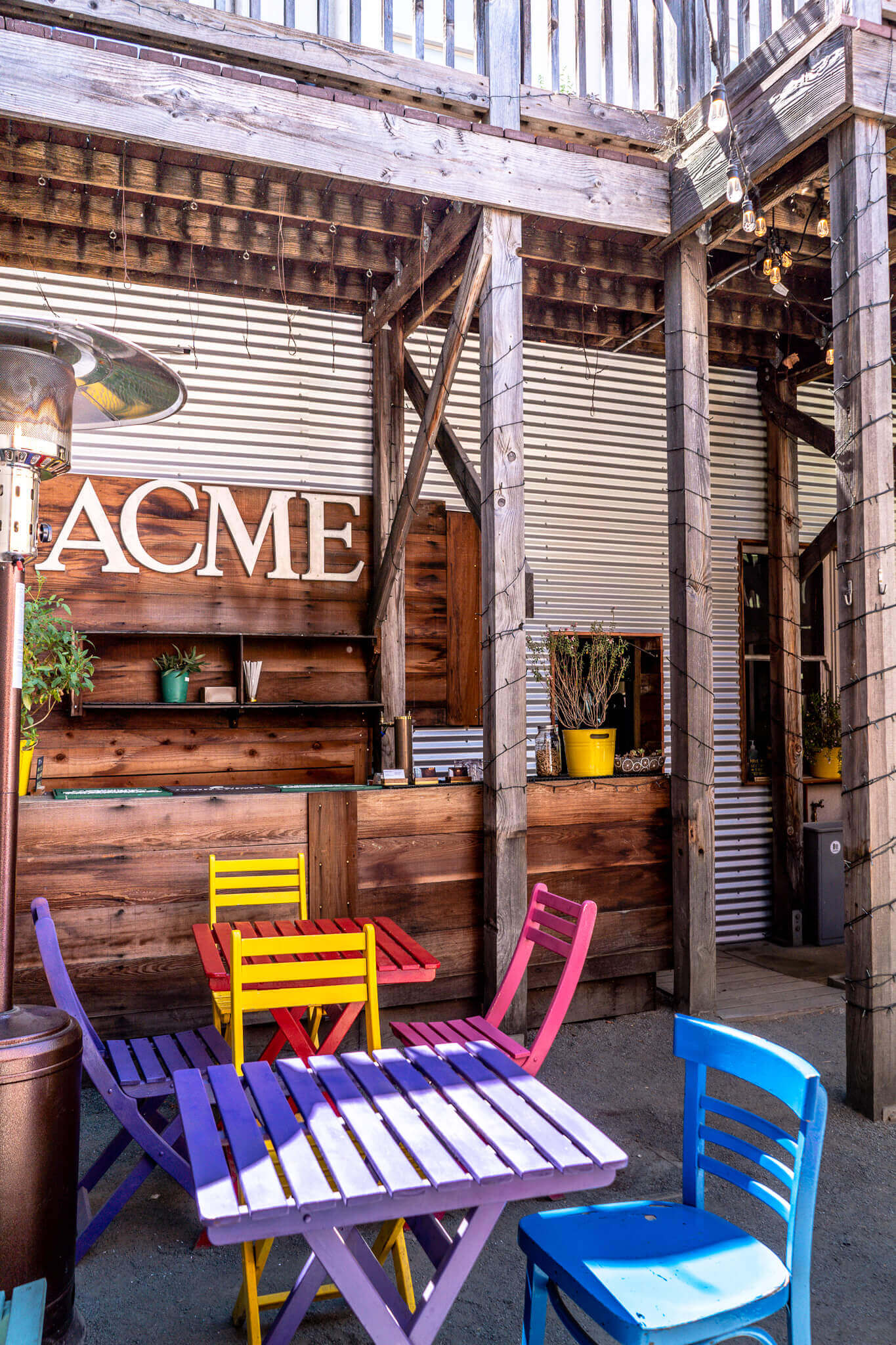 Private room at Acme Bar & Company with rustic charm, perfect for casual gatherings and networking.