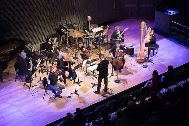 Live orchestral performance in Noe Music concert hall, ideal for corporate events.