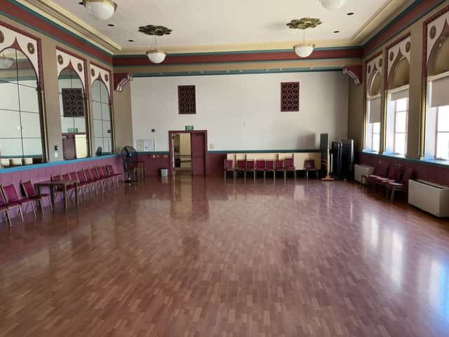 Spacious Lake Merritt ballroom with polished floors, ideal for events and workshops.