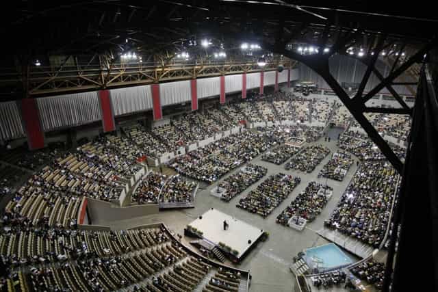 Exposition Center at Cow Palace Arena, showcasing a large event with organized seating.