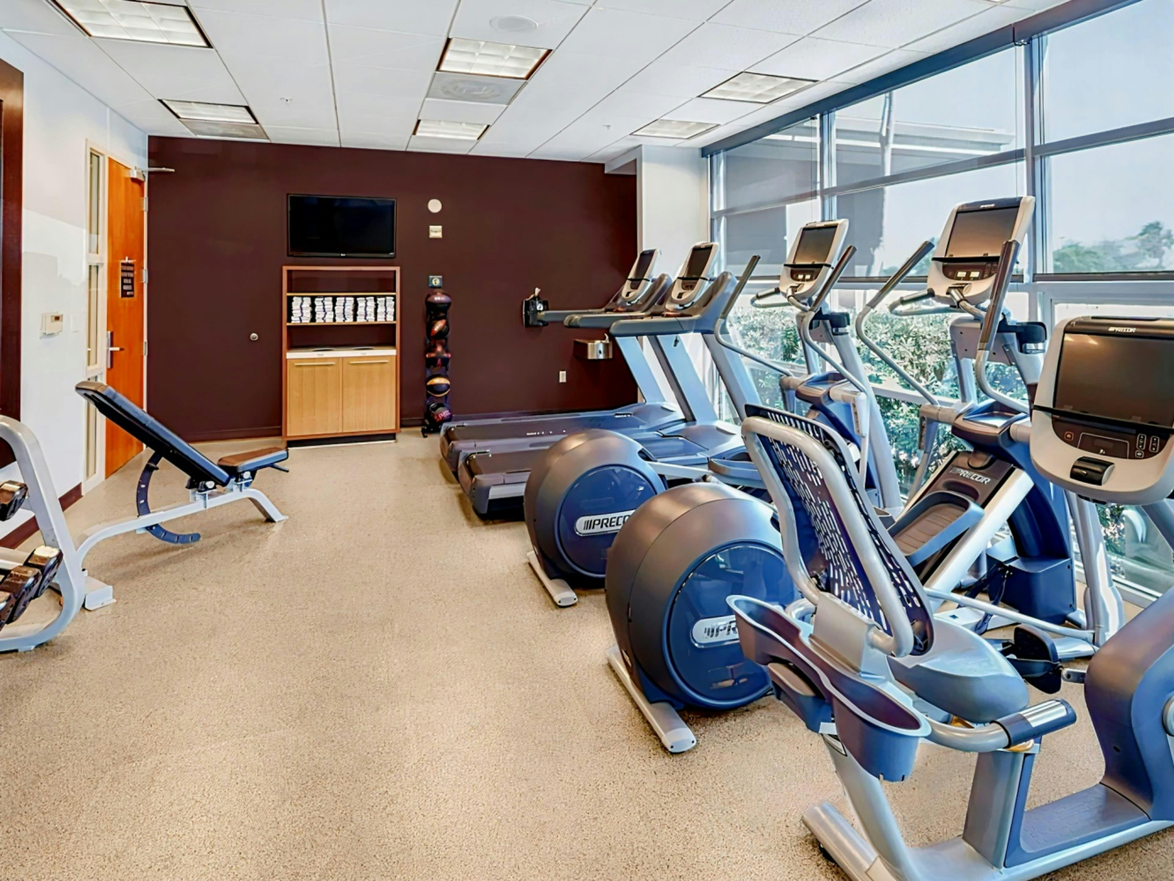 Modern fitness room at Hilton Garden Inn, ideal for corporate retreats and wellness events.