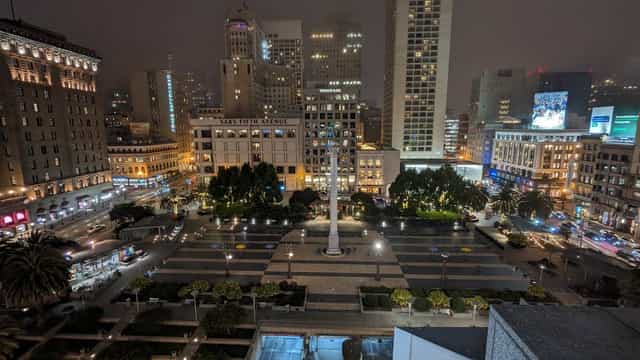 Vibrant urban plaza at night, perfect for outdoor events and gatherings.