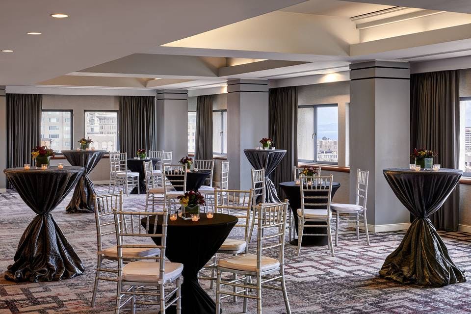 Union Square Ballroom with elegant round tables, perfect for networking events in San Francisco.