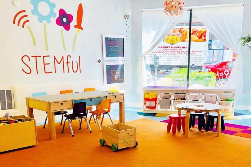 Vibrant STEM education center with colorful decor for engaging workshops and children's programs.