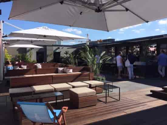 Grand Central Rooftop Bar with elegant seating, ideal for events and gatherings.