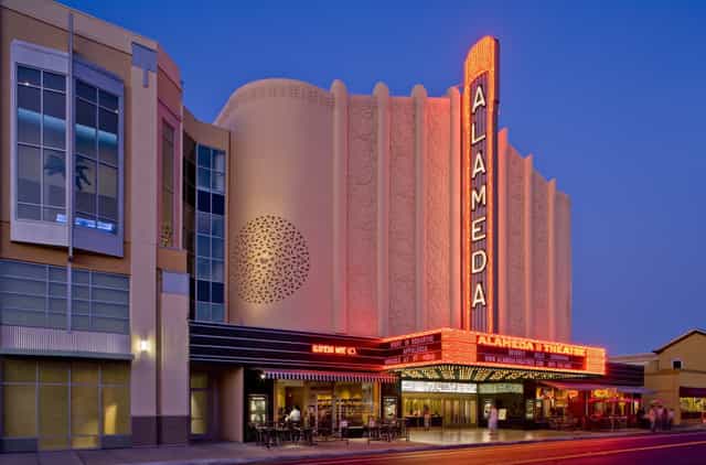 Historic Alameda Theatre with vibrant marquee, perfect for events and screenings.