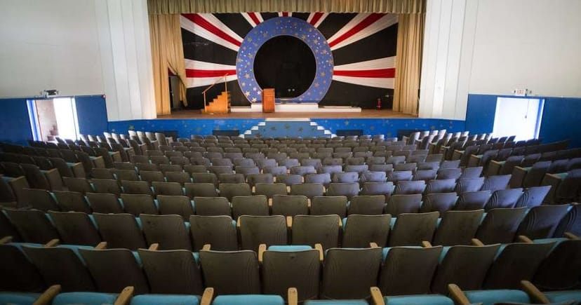 Presidio Theatre auditorium with vibrant stage, perfect for performances and presentations.