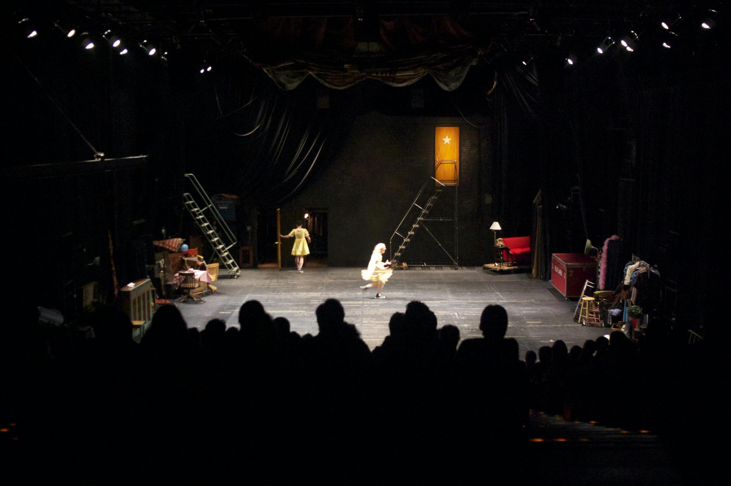 Z Space Steindler Stage set for a performance with audience silhouettes, creative ambiance.