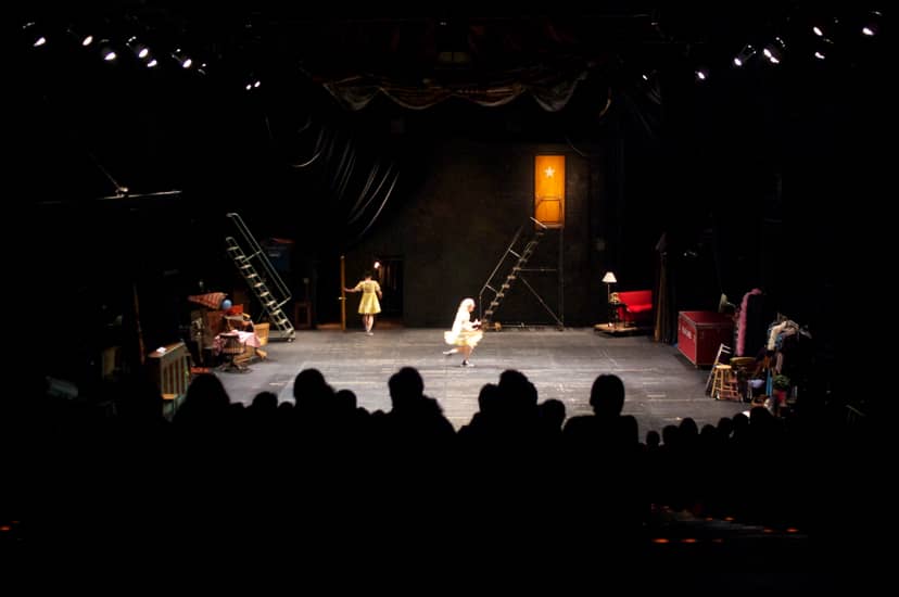 Z Space Steindler Stage set for a performance with audience silhouettes, creative ambiance.