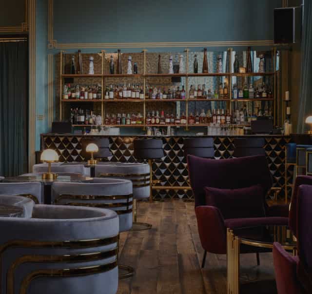 Stylish Mirror Bar in Arlo Williamsburg, perfect for upscale networking events and receptions.
