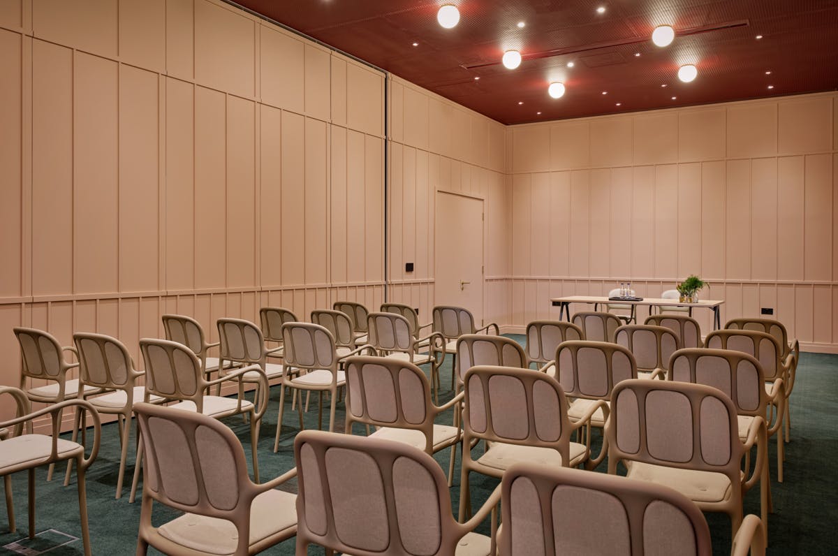 Modern meeting room in art'otel London, ideal for presentations and workshops.