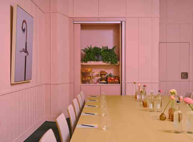 Stylish meeting room with pink tones, perfect for creative workshops at art'otel London.