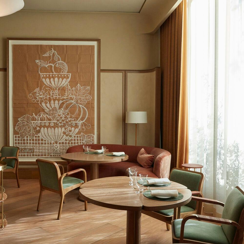 Main Dining Room at Quince Restaurant, elegant tables for upscale events and gatherings.