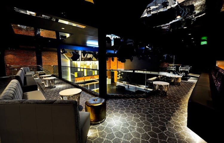 Stylish modern nightclub with sleek seating, perfect for networking events and private gatherings.