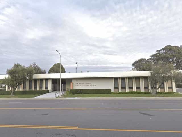 Ronald H. Born Auditorium, modern venue for meetings and events, surrounded by greenery.