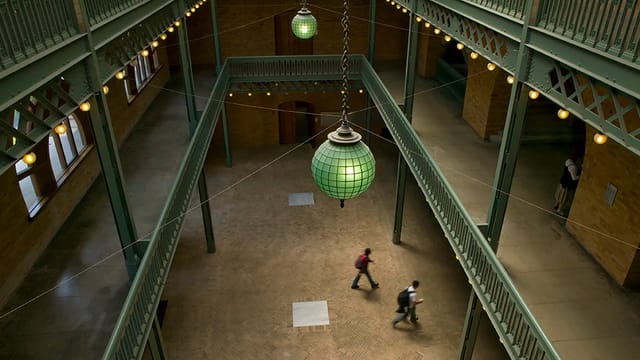Banatao Room in Berkeley: spacious venue with green pendant lights for events and gatherings.