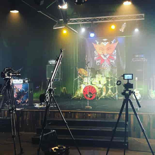 Stage Room at Soundwave Studios with drum kit, ready for live music event recording.