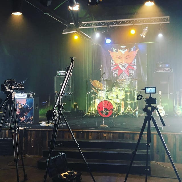 Stage Room at Soundwave Studios with drum kit, ready for live music event recording.