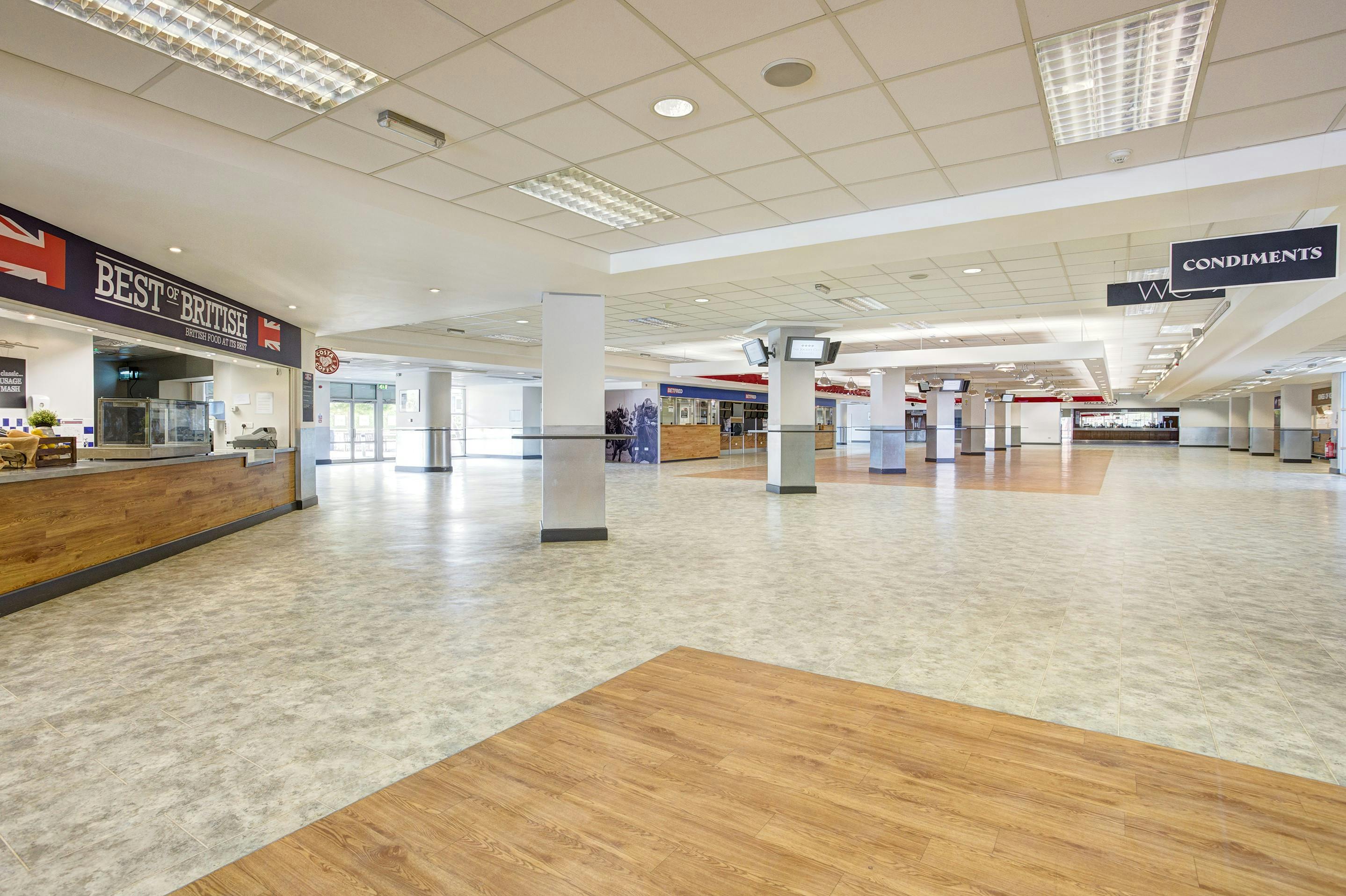 Spacious Exhibition Hall at Kempton Park Racecourse, ideal for events and catering.