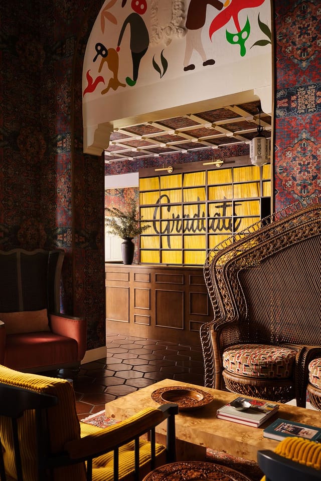 Stylish event space at Graduate Berkeley Hotel with "Gratitude" wall for gatherings.