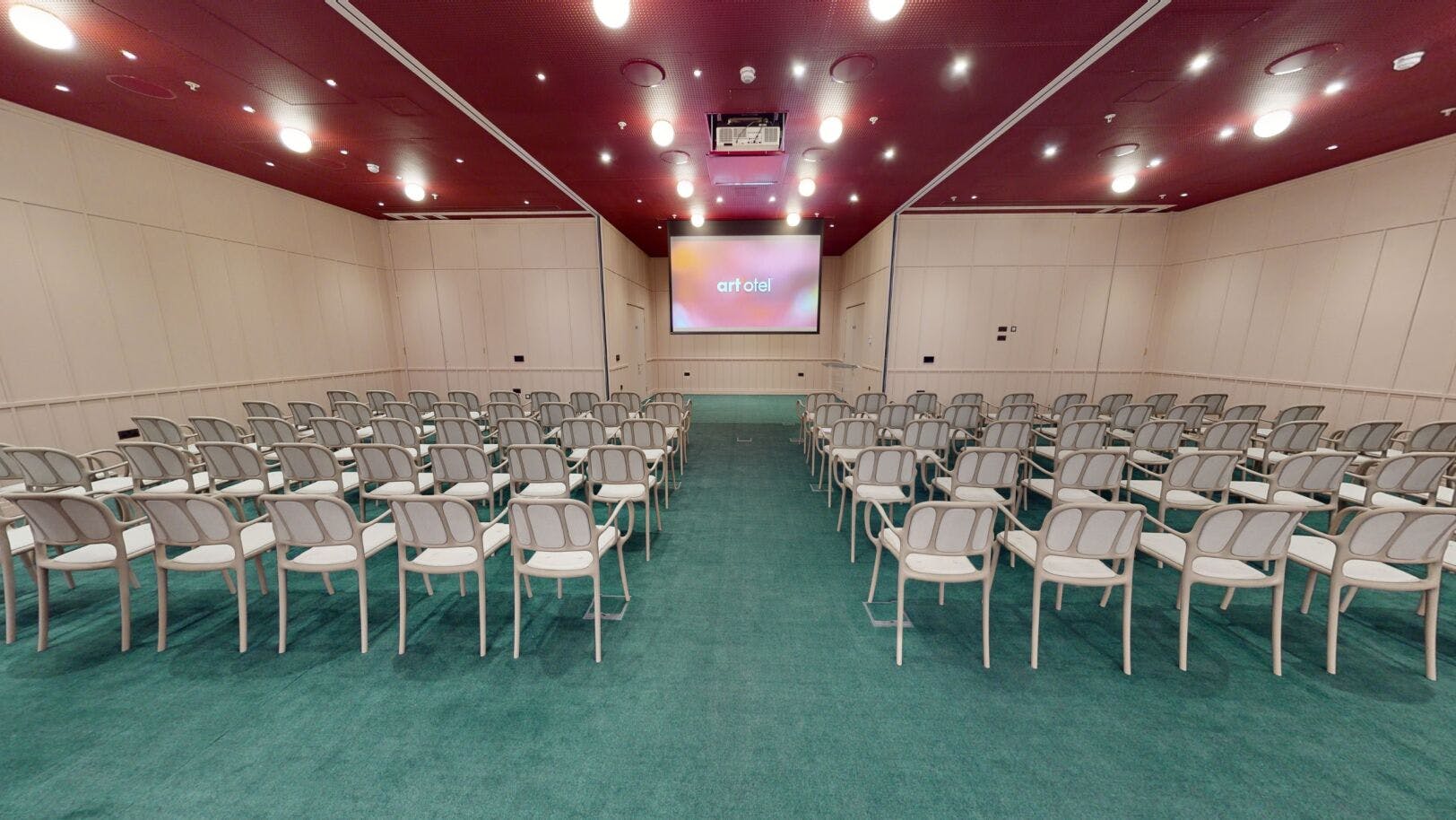 Conference room at art'otel London with modern design, ideal for presentations and events.