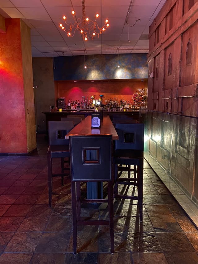 Colorful dinette bar with modern design, ideal for networking events and cocktail receptions.