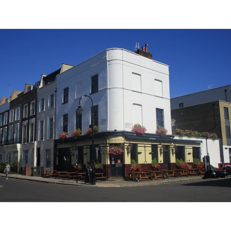 Charming Lansdowne Pub bar with outdoor seating, ideal for casual networking events.