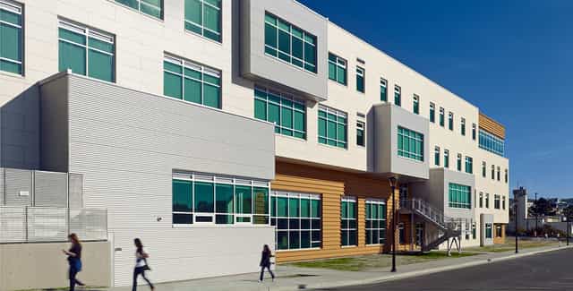 Modern Multi-Use Building at City College, ideal for events with large windows and outdoor space.