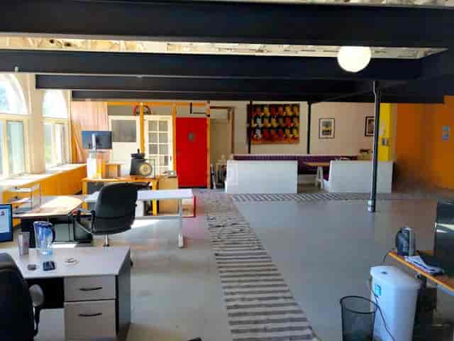 Modern event space with flexible seating for creative meetings and workshops.