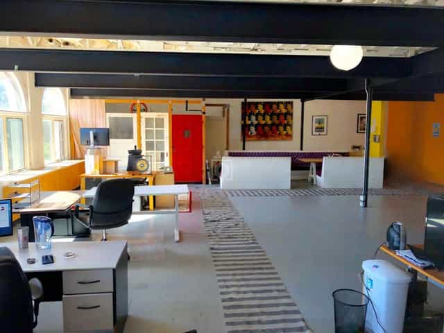 Modern event space with flexible seating for creative meetings and workshops.