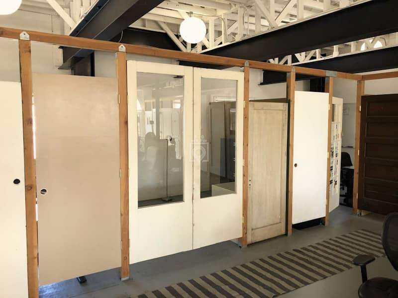 Versatile meeting space with sliding doors for corporate events and discussions.