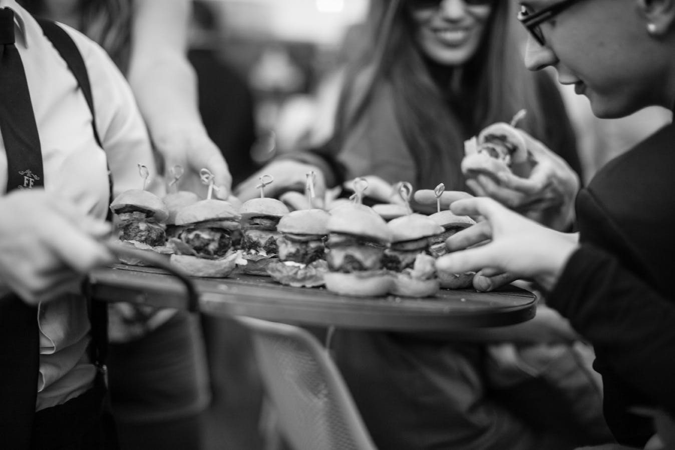 Elegant catering sliders for large events, fostering networking and interaction.
