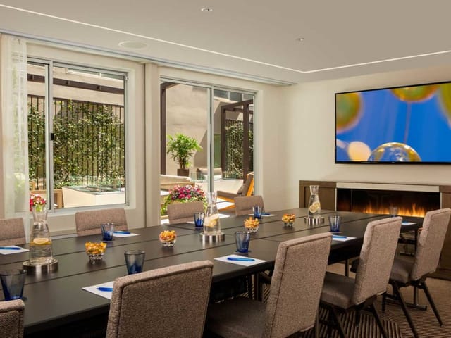 Modern meeting room in Farallon Hall with blue glassware, perfect for events and collaboration.