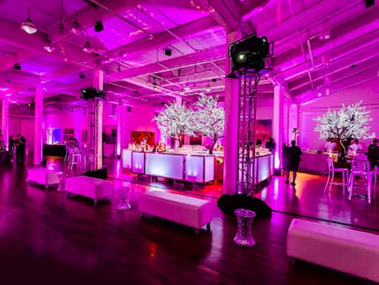 Vibrant event venue in THE CENTER SF with pink lighting, ideal for upscale gatherings.