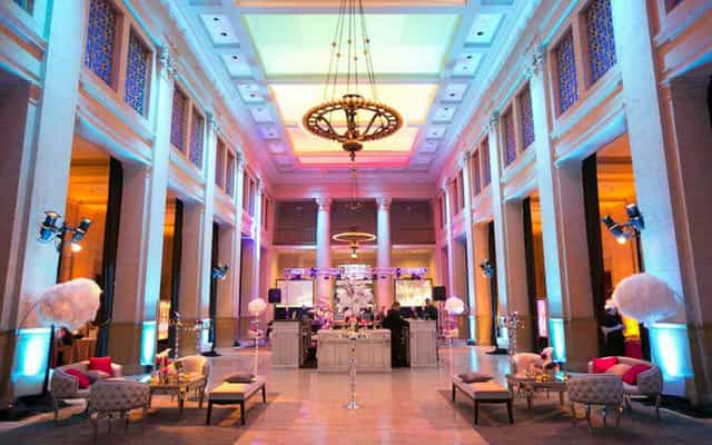 Elegant event venue in THE CENTER SF with stylish seating and ambient lighting.